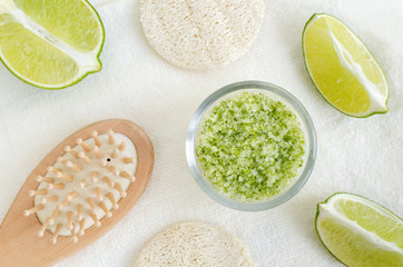 Homemade lime scrub with lime zest and juice, sea salt and olive oil. DIY beauty treatments and spa recipe. Top view, copy space.