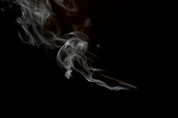 smoke or steam on a black background