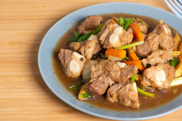 Pork spare rib stir fried with soy sauce and black pepper