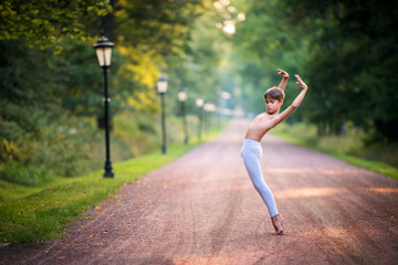 boy dancing in the park