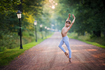 boy dancing in the park