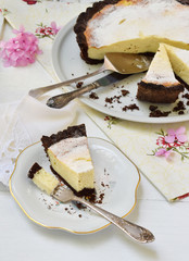 Vanilla cheesecake on chocolate shortbread dough. Cheese pie. Homemade baking