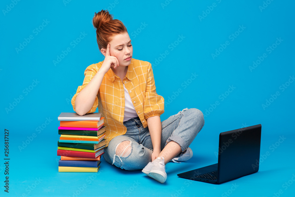 Wall mural education, high school, technology and people concept - sad red haired teenage student girl in check