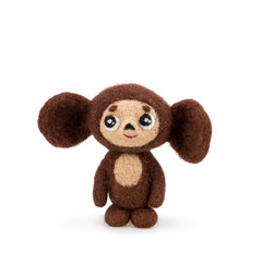 Children's toy Cheburashka on a white background