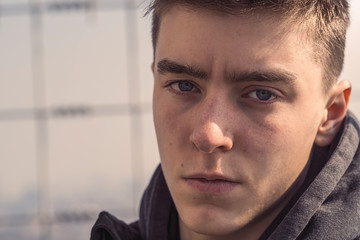 close up portrait of a young serious man