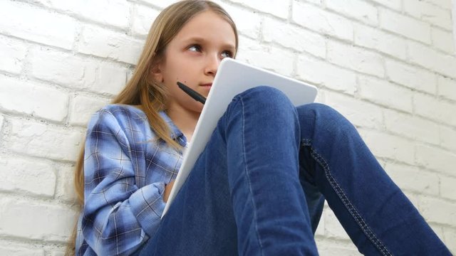 Child Studying on Tablet, Girl Writing in School Class, Learning Doing Homework