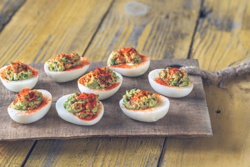Guacamole and bacon deviled eggs
