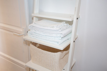 Fototapeta na wymiar white towels arranged in the bathroom