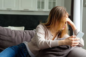 Upset girl with a phone