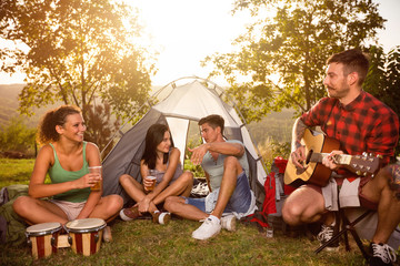 Positive young people on camping trip