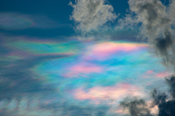 Iridescent clouds in the evening time. 