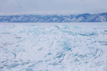 Fototapeta na wymiar Turquoise ice floes. Winter. Baikal lake