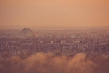 Warsaw foggy city and block of flates with sunrise beautiful colors