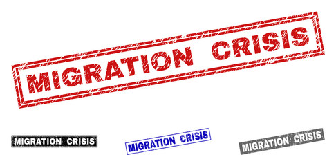 Grunge MIGRATION CRISIS rectangle stamp seals isolated on a white background. Rectangular seals with grunge texture in red, blue, black and grey colors.