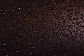 Water drops on a black background.