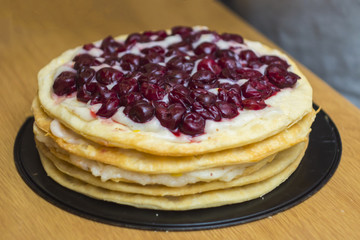 home made cake napoleon vith cherry