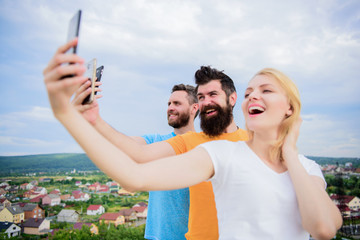 Mobile dependency problem. Girl and man with mobile smartphones communication online. Selfie time....