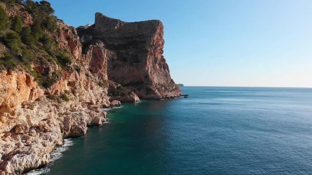 Cliffs in Moraig cove beach in Benitatxell, Alicante, Spain