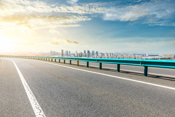 Asphalt highway passing through the city above in Shanghai at sunset