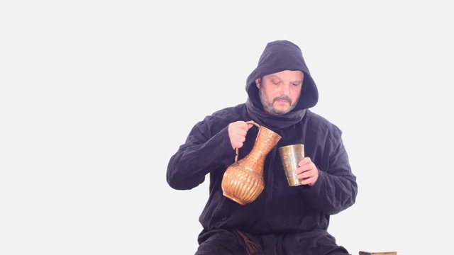 modest meal of medieval man in hoodie white scren 
