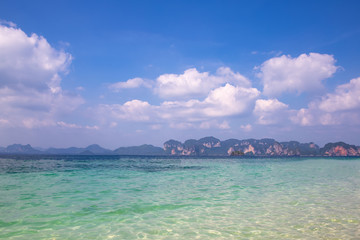 Beautiful sea coast. Bright sunny seascape. Concept for background, poster, calendar, leisure, tourism.