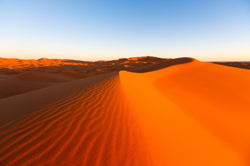 Fototapeta na wymiar Amazing view of the great sand dunes in the Sahara Desert, Erg Chebbi, Merzouga, Morocco.