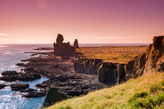 Snaefellsjoekull national park, Londrangar, Hellnar, sunset and Icelandic colorful and wild landscape on Iceland