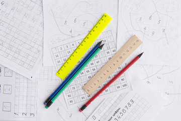 Materials for teaching children to count. Numbers. Mathematics background. Pencils and rulers.