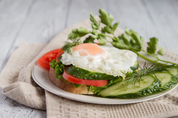 Sandwich with scrambled eggs.