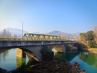 Fototapeta na wymiar Bridge over the Tiber River in Umbertide, Umbria, Italy.