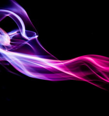 Colored smoke on black background