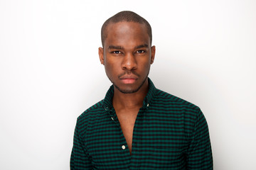 Close up cool young african american male fashion model against isolated white background