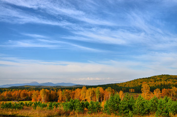 Fototapeta premium Warm Golden autumn in the mountains of the southern Urals. A great time for photographers and artists.