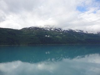 Fototapeta na wymiar Bleak Snow Covered Mountains along the Inside Passage in Alaska