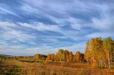 Fototapeta premium Warm Golden autumn in the mountains of the southern Urals. A great time for photographers and artists.
