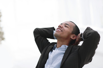 dreams of a young businessman sitting at his Desk