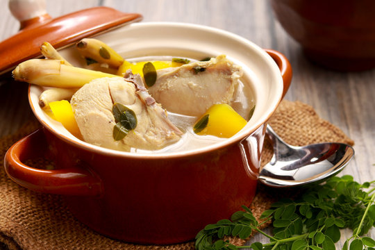 Chicken in Ginger and Lemongrass Broth in a pot. Tinolang Manok from Philipines.