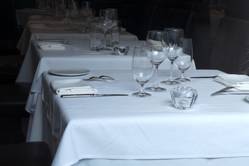 set table restaurant plate wine glass white tablecloth and napkin