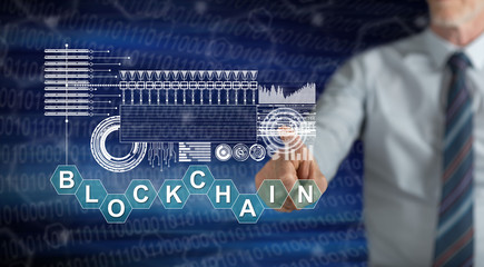 Man touching a blockchain concept