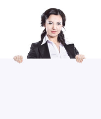 close up. business woman showing blank banner.isolated on white