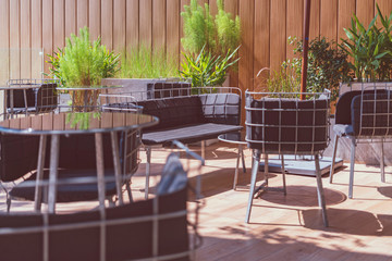 outdoor wooden wall terrace with loose furniture decoration home concept