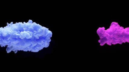 Super slowmotion shot of color inks in water. Shot with high speed camera at 4K.