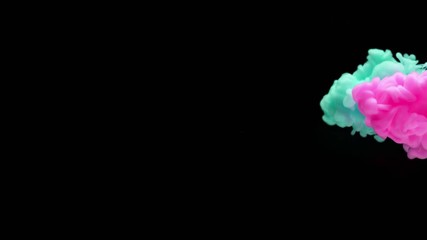Super slowmotion shot of color inks in water. Shot with high speed camera at 4K.