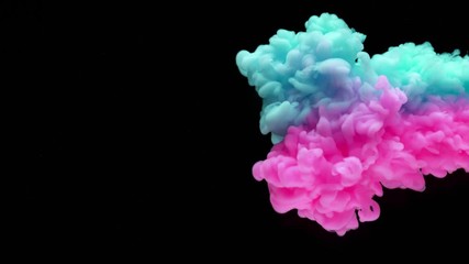 Super slowmotion shot of color inks in water. Shot with high speed camera at 4K.