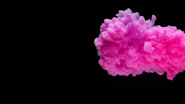 Super slowmotion shot of color inks in water. Shot with high speed camera at 4K.