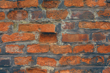 Old brick wall. Vintage dilapidated cement brick wall grunge. Gray brick wall cement texture background. Vintage red brick wall grey, black background.