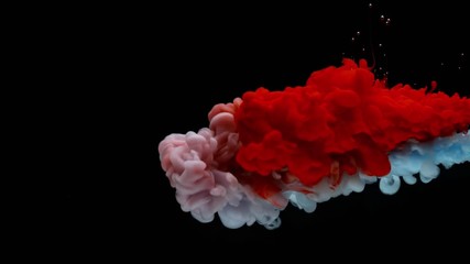 Super slowmotion shot of color inks in water. Shot with high speed camera at 4K.