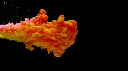 Super slowmotion shot of color inks in water. Shot with high speed camera at 4K.