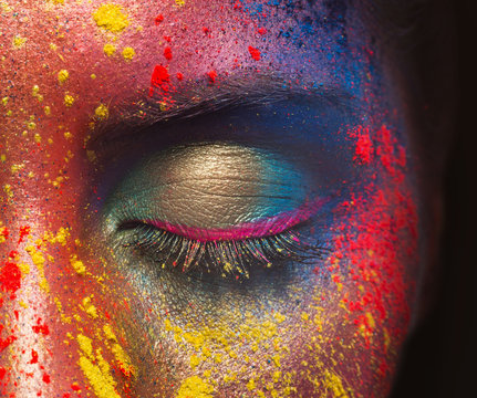 Beauty model with colorful powder make up