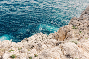 Capri coast view. Beautiful island beach with rocks